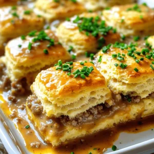To make a Biscuits and Gravy Breakfast Casserole, you need a few key ingredients. Here’s what you will need: - 1 package (16 oz) refrigerated biscuit dough - 1 pound breakfast sausage (spicy recommended) - 1/4 cup all-purpose flour - 2 cups milk (whole or 2% for creaminess) - 1/2 teaspoon garlic powder - 1/2 teaspoon onion powder - 1/2 teaspoon freshly cracked black pepper - 1 teaspoon salt - 4 large eggs, at room temperature - 1 cup shredded sharp cheddar cheese - Fresh chives or parsley for garnish (optional) Gathering these ingredients is the first step to your delicious breakfast delight. The biscuit dough creates a fluffy base, while the sausage adds a savory kick. The combination of eggs and cheese binds everything together, making each bite rich and satisfying. Don't forget the optional garnishes, as fresh herbs brighten the dish and offer a pop of color. For the full recipe, check out the details in the section below. First, preheat your oven to 350°F (175°C). This helps the casserole cook evenly. A hot oven ensures that the biscuits rise and turn golden brown. In a large skillet, add the breakfast sausage. Cook it over medium heat. Break the sausage into small pieces with a spatula. Cook until it is brown, about 5-7 minutes. After it is cooked, sprinkle the flour over the sausage. Stir well and let this cook for another 1-2 minutes. It helps to toast the flour a bit. Gradually pour in the milk while stirring. This keeps the gravy smooth. Add garlic powder, onion powder, black pepper, and salt. Cook until thickened, stirring often, about 5-7 minutes. Then, remove it from heat. In a large mixing bowl, whisk the eggs until they are fully beaten. They should look a bit frothy. Next, gently fold in the shredded cheddar cheese. This step adds great flavor. Now, take the refrigerated biscuit dough and cut each biscuit into quarters. Add these pieces to the egg mixture. Stir gently to combine everything. Do not over-mix; you want some biscuit texture in the mix. Grease a 9x13 inch baking dish with cooking spray or butter. Pour half of the biscuit mixture into the dish. Spread it evenly. Next, spoon the sausage gravy over this layer. Make sure to cover it well. Then, spread the remaining biscuit mixture over the gravy. Ensure it is evenly distributed, too. Place the baking dish in the preheated oven. Bake for 25-30 minutes. You want the biscuits to have a golden brown color. Check to make sure the casserole is cooked through. It should feel firm but not dry. You can find the complete process in the Full Recipe. To get a great texture, do not over-mix the biscuit dough. When you cut the biscuits, aim for quarter-sized pieces. This helps keep the biscuits fluffy. Make sure the sausage gravy is thick, but not too thick. It should pour easily over the biscuits. Serve this casserole warm, cut into squares. You can drizzle extra sausage gravy on top for more flavor. Pair it with fresh fruit or a light salad for balance. This makes a great brunch dish or a filling breakfast. Add some fresh chives or parsley on top for color. This not only looks nice but also adds a fresh taste. You can also sprinkle some extra cheese on top before baking for a cheesy crust. For a spicy kick, try adding sliced jalapeños as a garnish. {{image_4}} If you want a meat-free version, it’s easy to swap out the sausage. Use a plant-based sausage or mushrooms instead. Sauté the mushrooms until they are golden brown. This gives a nice, hearty flavor. Add your choice of veggies, like bell peppers or spinach, for a fresh touch. You can still use the same creamy gravy recipe to keep it rich and satisfying. Cheese can change the flavor of your casserole. While cheddar is great, try other types for variety. Pepper jack gives a spicy kick. Mozzarella makes it gooey and stretchy. For a tangy twist, use feta or goat cheese. Feel free to mix different cheeses for a unique taste. Just remember to keep the amount the same, about one cup. You can customize the sausage flavor to match your taste. Use spicy sausage for heat or mild for a gentler flavor. You can also mix in herbs and spices. Try adding Italian seasoning or smoked paprika for depth. If you prefer, cook sausage with a hint of maple syrup for a sweet touch. This adds a new layer to your casserole, making it special. For the full recipe, check out the instructions above! You can store leftover Biscuits and Gravy Breakfast Casserole in the fridge. Use an airtight container to keep it fresh. It will last about 3-4 days. Make sure to let it cool before sealing. This helps avoid extra moisture. You can freeze the casserole too. First, let it cool completely. Cut it into serving squares. Wrap each piece tightly in plastic wrap, then place them in a freezer-safe bag. It can last up to 3 months in the freezer. Label the bag with the date for easy tracking. To reheat, take a piece out of the fridge or freezer. If it's frozen, thaw it overnight in the fridge. Preheat your oven to 350°F (175°C). Place the casserole on a baking sheet. Cover it with foil to keep it moist. Heat for about 20-25 minutes or until it's warm all the way through. Enjoy it with a drizzle of extra gravy if you like! For more details, check the Full Recipe. You can store leftover casserole in the fridge for about three to four days. Keep it in an airtight container to keep it fresh. If you want to enjoy it longer, freezing is a great option. Just make sure to wrap it well. Yes, you can use homemade gravy! It adds a personal touch. You can make it with any meat or even go meatless. Just ensure your gravy is thick enough to hold the casserole together. This casserole pairs well with fresh fruit, a light salad, or even crispy hash browns. You can also serve it with a side of eggs, cooked any style. A fruit smoothie can add a refreshing touch too. Absolutely! You can prepare it the night before. Just assemble it, cover it, and store it in the fridge. When ready to bake, take it out and let it sit for about 30 minutes. Then bake as directed in the Full Recipe. Enjoy the ease of a ready meal! You learned how to make a delicious Biscuits and Gravy Breakfast Casserole. We covered the ingredients, step-by-step instructions, and helpful tips. You now know variations to fit your taste. Proper storage details will help keep leftovers fresh. This dish is easy to make and great for breakfast or brunch. Remember, you can customize the recipe to meet your needs. Enjoy every bite of this tasty meal!