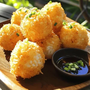 - 2 cups cooked sushi rice - 1/2 teaspoon salt - 1/4 cup freshly grated Parmesan cheese - 1/4 cup green onions, finely chopped - 1/2 cup panko breadcrumbs - 1/2 cup all-purpose flour - 2 large eggs, beaten - Vegetable oil for frying - Soy sauce for dipping You can add ingredients to change the taste. For example: - Spices: A pinch of garlic powder or chili flakes gives a kick. - Herbs: Fresh herbs like basil or cilantro add a fresh taste. - Cheese: Try adding mozzarella or cheddar for a cheesy twist. Using good ingredients matters a lot. Fresh sushi rice makes the best base for these rice balls. The rice should be sticky yet firm, which helps keep the balls together. Also, high-quality Parmesan cheese adds depth of flavor. Fresh green onions bring brightness and crunch. Panko breadcrumbs provide that perfect crispy texture. Choosing good ingredients ensures that your rice balls will taste amazing. Each bite should be a mix of soft rice and crunchy coating. When you use quality ingredients, your dish will shine. Start by gathering your ingredients. In a large mixing bowl, combine: - 2 cups cooked sushi rice - 1/2 teaspoon salt - 1/4 cup freshly grated Parmesan cheese - 1/4 cup green onions, finely chopped Mix these together well. Make sure the cheese and onions are evenly spread. This will give your rice balls a tasty flavor. After mixing, wash your hands and grab about 2 tablespoons of the rice mix. Roll this into a ball shape. Repeat until you have 12 rice balls. Next, set up your breading station. You will need three bowls: 1. One with 1/2 cup all-purpose flour 2. One with 2 large beaten eggs 3. One with 1/2 cup panko breadcrumbs Take each rice ball and roll it in the flour first. This helps the egg stick. Then, dip it into the beaten eggs. Let any extra egg drip off. Finally, roll the ball in the panko breadcrumbs. Make sure it is fully coated. Now, it’s time to fry! In a large frying pan, pour in vegetable oil until it is about 1 inch deep. Heat the oil on medium-high heat. To check if the oil is hot, drop a small piece of breadcrumb in. If it sizzles, it’s ready! Gently add several rice balls to the oil, but don’t overcrowd the pan. Fry them for about 3-4 minutes. You want them to turn golden brown. Remember to flip them occasionally to cook all sides evenly. Once they are golden, use a slotted spoon to lift them out. Place the rice balls on a plate lined with paper towels. This will soak up any extra oil. Serve your crispy rice balls warm with soy sauce for dipping. Each bite will be a tasty treat! To get that perfect crunch, choose high-quality panko breadcrumbs. They are lighter and flakier than regular breadcrumbs. When you fry, use enough oil to cover the rice balls. This helps them cook evenly and get crispy all around. Fry them in batches, so they have space to bubble and brown. To prevent sogginess, avoid overcooking your rice. Cook it just until tender. Let the rice cool down before you shape it into balls. Moisture can make the coating soggy, so it’s best to use dry ingredients. Also, drain the fried rice balls on paper towels to soak up any extra oil. If you want a healthier option, consider air frying or baking. For air frying, preheat the air fryer and set it to 375°F. Spray the rice balls lightly with oil for a better crunch. Cook for about 10-12 minutes, flipping halfway through. For baking, place the rice balls on a baking sheet lined with parchment paper. Bake at 400°F for 20-25 minutes. Turn them halfway to ensure even crisping. Both methods cut down on oil and still yield tasty results. For the full recipe, check out the detailed instructions to enjoy these crispy delights! {{image_4}} You can mix it up with flavors! For a spicy kick, add some chopped jalapeños or sriracha to the rice mixture. If you love cheese, try adding mozzarella for a melty center. For a herbed version, mix in fresh herbs like parsley or basil. Each option brings a unique taste, making the rice balls more fun to eat. You can easily make these rice balls vegetarian. Skip the cheese and use nutritional yeast for a cheesy flavor. For a vegan option, replace the eggs with a mixture of ground flaxseed and water. This will help bind the rice balls together. It’s a great way to enjoy a tasty treat without animal products. Dipping sauces can change the game! Soy sauce is a classic choice, but you can try others too. A sweet chili sauce adds a nice touch of heat and sweetness. For a creamy dip, mix mayonnaise with a bit of sesame oil and lime juice. You can also serve them with a tangy ponzu sauce for a refreshing twist. - Suggestions for side dishes: Pair the rice balls with a fresh salad or some steamed veggies. These sides add color and balance, making your meal complete and delicious. To keep your crispy rice balls fresh, store them in an airtight container. Place parchment paper between layers to avoid sticking. They stay good in the fridge for up to three days. If you have extra rice balls, let them cool first. This helps prevent moisture buildup, which can make them soggy. When you're ready to enjoy your leftover rice balls, reheating is key. For the best results, use an oven. Preheat it to 350°F (175°C). Place the rice balls on a baking sheet and heat for about 10-15 minutes. This method keeps them crispy and warm. If you're in a hurry, you can use a microwave. Just be aware that the texture may not be as crispy. Freezing rice balls is great for meal prep. To freeze, first, let them cool completely. Then, place them on a baking sheet lined with parchment paper. Freeze them for about an hour until firm. After that, transfer the rice balls to a freezer-safe bag. They can last up to three months. When you're ready to eat them, bake directly from frozen. This method keeps them tasty and convenient. For more details, check the Full Recipe. To make rice balls stick, use warm sushi rice. The warmth helps the rice grains bond. Mix in salt, Parmesan, and green onions well. Wet your hands before shaping the balls. This prevents sticking to your hands. Yes, you can use other rice types! Short-grain rice works well for a sticky texture. Medium-grain rice can also work, but avoid long-grain rice. Long-grain rice does not stick together well. To check if the oil is hot, drop in a small piece of breadcrumb. If it sizzles, the oil is ready. You can also use a thermometer; aim for 350°F (175°C). Proper oil temperature ensures crispy rice balls. Crispy rice balls pair well with soy sauce for dipping. You can also serve them with spicy mayo, sweet chili sauce, or a tangy ponzu sauce. For a meal, add a side salad or steamed veggies. For the complete recipe, please refer to the Crispy Delightful Rice Balls section above. In this blog post, you learned how to make delicious crispy rice balls. We covered important ingredients, step-by-step instructions, and tips for achieving the perfect texture. Don't forget that quality ingredients make a big difference. You can also try different flavors and cooking methods, like air frying. Store leftovers carefully and enjoy them later. These rice balls are fun to make and share. Now, gather your ingredients and start cooking!