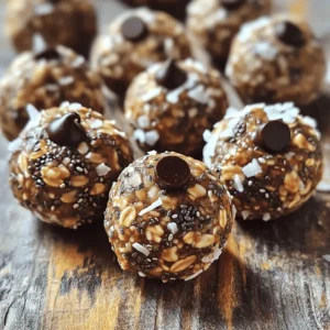 To make no-bake energy balls, you need a few key ingredients: - 1 cup rolled oats - 1/2 cup almond butter (or peanut butter) - 1/4 cup honey or maple syrup - 1/2 cup unsweetened shredded coconut - 1/2 cup dark chocolate chips - 1/4 cup chia seeds - 1/2 teaspoon pure vanilla extract - A pinch of sea salt These ingredients work together to create a tasty and healthy snack. The oats give you energy, while the nut butter adds protein. Honey or maple syrup sweetens the mix. The shredded coconut and chocolate chips bring extra flavor. Chia seeds add fiber and omega-3s. Salt enhances the taste. You can change your energy balls by adding different items. Here are some fun ideas: - 1/4 cup chopped nuts (like almonds or walnuts) for crunch - 1/4 cup dried fruits (like cranberries or raisins) for sweetness - 1 tablespoon flax seeds for extra fiber - 1 scoop protein powder for a protein boost Feel free to mix and match these options. They can add more flavor and nutrients to your energy balls. Each serving of these energy balls (about one ball) has: - Calories: 120 - Protein: 3g - Carbohydrates: 14g - Fat: 7g - Fiber: 2g - Sugar: 5g These stats show that no-bake energy balls are a smart snack. They provide energy and nutrients without empty calories. They are perfect for a quick bite or a tasty treat. For the full recipe, check out the details above. To start, grab a large mixing bowl. Add 1 cup of rolled oats, 1/2 cup of almond butter, and your choice of 1/4 cup honey or maple syrup. Mix these ingredients well. You want the blend to be slightly creamy. This creamy base is key for a good texture. Next, it’s time to jazz up the mixture. Add in 1/2 cup of unsweetened shredded coconut, 1/2 cup of dark chocolate chips, and 1/4 cup of chia seeds. Don’t forget to pour in 1/2 teaspoon of pure vanilla extract and a pinch of sea salt. Use a sturdy spoon to stir everything together. You should end up with a sticky, cohesive mixture. Now comes the fun part! With clean hands, scoop out portions of the mixture. Aim for about 1 inch in diameter for each ball. If the mixture sticks to your hands, lightly wet them with water. This tip really helps! Place the rolled energy balls on a tray lined with parchment paper. Make sure to space them out to avoid sticking. Once you've rolled all the mixture, put the tray in the fridge. Chill them for at least 30 minutes. This will make them firm up nicely. If you have leftovers, store them in an airtight container. You can keep them in the fridge for up to a week or freeze them for a longer snack option. For the full recipe, check out the details above! To get the best no-bake energy balls, mix well. Start by combining oats and nut butter. Use a large bowl for this. Add honey or maple syrup next. Stir until the mixture feels creamy. When you add coconut, chocolate chips, and chia seeds, mix carefully. You want everything evenly spread. I find it helps to use a sturdy spoon or spatula. When rolling the balls, keep your hands slightly wet. This stops the mixture from sticking. Aim for 1-inch sizes for easy snacking. Place them on parchment paper so they don’t touch. One mistake is not mixing enough. If the mix is dry, the balls fall apart. Make sure to add enough nut butter or syrup. Another issue is rolling them too big. Larger balls can be hard to eat. Stick to the 1-inch guideline for best results. Also, don’t skip the chilling step. Chilling helps them set. If you skip this, they may not hold shape. For added taste, try different nut butters. Peanut butter gives a nice twist. You can also add spices like cinnamon for warmth. To boost nutrition, try adding protein powder or ground flaxseed. Both options increase protein and fiber. You can also switch up the mix-ins. Dried fruits like cranberries or raisins add sweetness. Nuts give a nice crunch and more nutrients. For the full recipe, check the recipe section. Enjoy making these energy balls! {{image_4}} To boost protein, add protein powder to your energy balls. Start with one scoop of your favorite protein powder. Mix it in with the oats and nut butter. This change makes your snack more filling. It also helps with muscle recovery after workouts. You can use whey, pea, or soy protein. Each type offers unique benefits, so choose what fits your diet best. For nut-free energy balls, swap almond butter with sunflower seed butter. This choice keeps the flavor and texture nice. You can also use pumpkin seed butter. Both options are safe for those with nut allergies. Ensure to check labels for allergens. This way, you keep everyone safe while enjoying a tasty treat. Feel free to get creative with flavors. For a sweet twist, add dried fruits like cranberries or apricots. These fruits add natural sweetness and chewiness. For a savory version, try mixing in herbs and spices. Consider using cinnamon or a hint of sea salt. You can even add cheese for a unique flavor. The sky's the limit with combinations! Check out the Full Recipe for more ideas on energy ball variations. To keep your no-bake energy balls fresh, store them in the fridge. Use an airtight container to keep moisture out. This way, they stay tasty for up to a week. If you see any signs of moisture, remove the energy balls and check for spoilage. If you want to save some energy balls for later, freezing is a great option. Place them on a tray first, so they don’t stick together. Freeze for about an hour, then transfer them to a freezer-safe bag. This method keeps them good for up to three months. Just remember to label the bag with the date! Check your energy balls for any changes in smell or look. If they smell odd or develop mold, it’s time to toss them. Also, if they feel very dry or hard, they may not taste good anymore. Always trust your senses to decide if they are still safe to eat. You can customize your no-bake energy balls in many ways. Start by changing the nut butter. Almond butter gives a creamy texture, but you can swap it for peanut butter or sunflower seed butter. Next, try adding different mix-ins. You can include dried fruits, like raisins or cranberries, for extra sweetness. Seeds like flaxseed or pumpkin seeds add crunch and nutrients. For a fun twist, add spices like cinnamon or nutmeg. You can also change the chocolate chips. Use milk chocolate, white chocolate, or even carob chips for variety. Adjust these ingredients based on your taste and what you have on hand. Yes, you can use other sweeteners in your energy balls. Agave syrup is a great option if you want a vegan choice. You can also try brown rice syrup for a thicker texture. If you prefer a low-calorie option, use stevia or monk fruit sweetener. Just keep in mind that these sweeteners may change the flavor and texture a bit. Make sure to adjust the amount based on how sweet you want your energy balls to be. Experimenting with different sweeteners can help you find your favorite flavor balance. If you need a substitute for almond butter, there are several great options. Peanut butter is the most common choice. It has a similar texture and flavor. Sunflower seed butter is another good option, especially for nut allergies. Cashew butter or tahini can work too, giving a unique taste. Just remember that each substitute may change the overall flavor slightly. Choosing the right butter depends on your taste and any dietary needs you may have. Enjoy trying out these different nut and seed butters in your no-bake energy balls! No-bake energy balls are easy and fun to make. We explored essential ingredients and optional add-ins to boost flavor. You learned step-by-step instructions, from mixing to rolling. I shared tips to avoid common mistakes and enhance taste. We also looked at variations for extra nutrition and storage tips. In the end, these snacks can fit your needs. Enjoy creating your own unique energy balls!