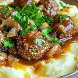 - 1 lb ground beef - 1/2 lb ground turkey - 1/2 cup breadcrumbs - 1/4 cup grated Parmesan cheese - 1 cup beef broth - 1 cup sliced mushrooms - 1 medium onion, thinly sliced - 2 tablespoons ketchup - 1 tablespoon Dijon mustard - 2 tablespoons Worcestershire sauce - 1 teaspoon garlic powder - 1 teaspoon onion powder - 1 large egg, lightly beaten - 2 tablespoons cornstarch - 2 tablespoons water (for thickening) These ingredients come together to create a dish so savory and comforting. The use of both ground beef and turkey gives the meatballs a rich flavor and a delightful texture. The breadcrumbs and Parmesan cheese help bind everything, keeping the meatballs moist and tender. For the sauce, the beef broth adds a deep, hearty flavor. The mushrooms and onions bring sweetness and depth. Ketchup and Dijon mustard brighten the sauce, adding a tangy twist. The Worcestershire sauce, garlic powder, and onion powder blend the flavors perfectly. The egg acts as a binder, making the meatballs hold their shape. Lastly, cornstarch thickens the sauce at the end, giving it that perfect velvety finish. You can find the full recipe in the article. With these ingredients, you’re set to create a delicious meal that warms the heart and pleases the palate. To start, gather your ingredients. In a large bowl, combine the following: - 1 lb ground beef - 1/2 lb ground turkey - 1/2 cup breadcrumbs - 1/4 cup grated Parmesan cheese - 1 large egg, lightly beaten - 2 tablespoons Worcestershire sauce - 1 teaspoon garlic powder - 1 teaspoon onion powder - Salt and pepper to taste Mix these ingredients well. Use your hands to knead them together. This helps blend the flavors fully. Once mixed, form the meat into balls. Aim for about 1 inch in diameter. Place them on a plate and set aside. Now, it’s time to set up your slow cooker. Layer the bottom with: - 1 medium onion, thinly sliced - 1 cup sliced mushrooms Next, mix the sauce ingredients in the slow cooker. Pour in: - 1 cup beef broth - 2 tablespoons ketchup - 1 tablespoon Dijon mustard Stir these together to combine. This will create a rich base for your meatballs. Gently arrange the meatballs on top of the sauce mixture. Make sure not to disturb the sauce. This keeps the meatballs above the liquid as they cook. Cover the slow cooker with its lid. You can choose to cook on low for 6-7 hours or on high for 3-4 hours. The meatballs will be done when they are tender and cooked through. After cooking, it’s time to thicken the sauce. In a small bowl, create a slurry by mixing: - 2 tablespoons cornstarch - 2 tablespoons water Stir this mixture into the slow cooker gently. This helps thicken the sauce while keeping the meatballs intact. Let the slow cooker run for an extra 15 minutes. This allows the sauce to thicken beautifully. For the full recipe, you can refer back to the ingredients and steps outlined above. Enjoy creating this savory dish! To make great meatballs, I like to mix ground beef and ground turkey. This blend gives the meatballs a nice flavor. Using two meats keeps them moist and tender. When you mix the meats, do not over-mix. Over-mixing makes the meat tough. Just combine the ingredients until they are well mixed. You can boost the flavor of your meatballs with different seasonings. Try adding herbs like thyme or parsley for a fresh taste. You can also add smoked paprika for a hint of smokiness. For a rich sauce, consider adding red wine or soy sauce. These ingredients deepen the sauce's flavor and make it more delicious. When serving, I love to pair the meatballs with creamy mashed potatoes or fluffy rice. These sides soak up the sauce well, making every bite tasty. To make your dish look special, garnish with fresh parsley. This adds color and a nice touch. You can also drizzle extra sauce over the top for an appealing finish. {{image_4}} You can switch up the meat in these meatballs for a fun twist. Using chicken or pork makes a tasty option. Just keep the same mix of breadcrumbs and seasonings. If you want to go meatless, try using lentils or mushrooms. Blend cooked lentils with breadcrumbs and spices for a hearty meatball. Mushrooms can add a rich, earthy flavor. You can even mix both for a unique taste. The sauce for these meatballs is key. You can change the flavor by adding different sauces. Try BBQ sauce for a smoky twist. Or add a splash of soy sauce for an Asian flair. Adding vegetables is an easy way to boost nutrition. Chop up bell peppers, carrots, or spinach and mix them into the sauce. They will add color and flavor while making your meal healthier. Pair these flavorful meatballs with a variety of sides. Creamy mashed potatoes are a classic choice. Rice or egg noodles also work well. For a fun topping, sprinkle fresh herbs like parsley or chives over the meatballs. You can also add a dollop of sour cream or yogurt for creaminess. These simple additions can elevate your dish and impress your guests. For the full recipe, check out Savory Slow Cooker Salisbury Steak Meatballs! To keep leftovers fresh, place them in airtight containers. This helps avoid any odors in your fridge. You should store the meatballs and sauce together for the best flavor. When stored correctly, Salisbury steak meatballs can last in the fridge for up to four days. Be sure to label your containers with the date, so you know when to use them. If you want to save some meatballs for later, freezing is a great option. Let the meatballs cool completely before freezing. You can freeze the meatballs and sauce together or separately. Use freezer-safe bags or containers to keep them fresh. When you’re ready to eat, thaw them in the fridge overnight. To reheat frozen leftovers, place them in a pot on low heat. Stir them gently until they are warm throughout. You can also use a microwave, but be careful not to overcook them. For easy meals during the week, portion the meatballs into servings. This way, you can grab a container when you need a quick meal. Pair them with rice or mashed potatoes for a complete dish. When reheating, make sure to warm them thoroughly. Check that the internal temperature reaches at least 165°F. This ensures they are safe to eat. Enjoy your quick meals without any stress! If you want to explore more recipes, check out the full recipe linked above. To keep your meatballs tender, use a mix of meats. I like combining ground beef and turkey. This blend adds moisture and flavor. Don't over-mix the meat. Gently combine your ingredients until just mixed. - Use fresh breadcrumbs instead of dry ones. - Add a beaten egg for moisture. - Consider adding milk or broth to the meat mixture. These tips will help you avoid dry meatballs. Yes! You can cook Salisbury steak meatballs on the stovetop. This method is quick and easy. - Heat a large skillet over medium heat. - Add some oil to the pan. - Brown the meatballs on all sides. - Once browned, add the sauce mixture. Let everything simmer for about 20 minutes. The meatballs will still be flavorful and juicy. To ensure safety, check the internal temperature of your meatballs. The USDA recommends a minimum of 160°F (71°C) for ground beef and turkey. - Use a meat thermometer to check. - Insert it into the center of a meatball. - If it reads 160°F, they're ready! This step ensures your meatballs are safe to eat and perfectly cooked. Absolutely! If you're short on time, store-bought sauce works great. Look for sauces that are rich and flavorful. - You can use mushroom gravy or a beef sauce. - Just pour it over the meatballs in the slow cooker. This saves time and still gives you a tasty dish. For a quick meal, this option is a lifesaver! For the complete recipe, check out the Full Recipe. We explored how to make Salisbury steak meatballs from start to finish. By using ground beef, turkey, and key seasonings, you can create tasty meatballs. Don't forget to layer your onions and mushrooms, which add depth to the dish. For sauces, we shared various options to enhance flavor. Lastly, remember to store leftovers properly and try different variations. This dish is versatile and easy to adapt, which makes it a great addition to any meal plan. Enjoy your cooking!